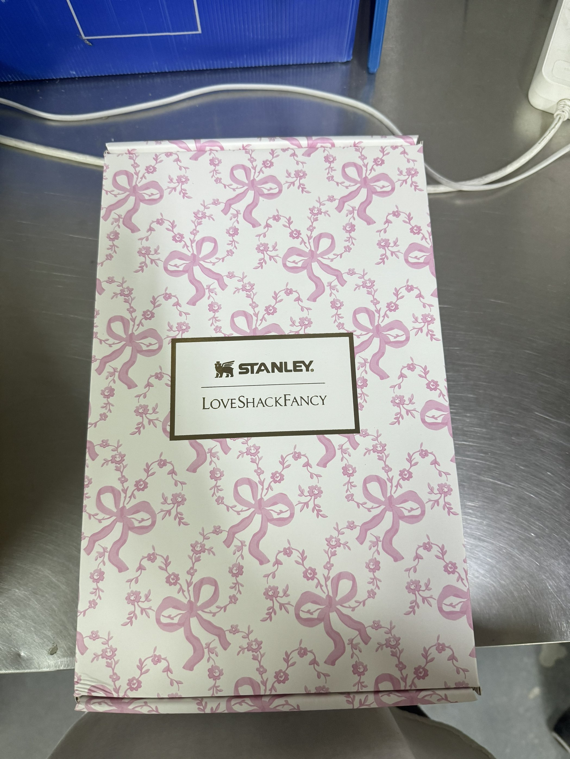 Stanley x LoveShackFancy 40oz insulated water bottle with Coquette Bow Chantilly design and floral pattern.