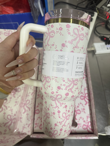 Stanley x LoveShackFancy 40oz insulated water bottle with Coquette Bow Chantilly design and floral pattern.