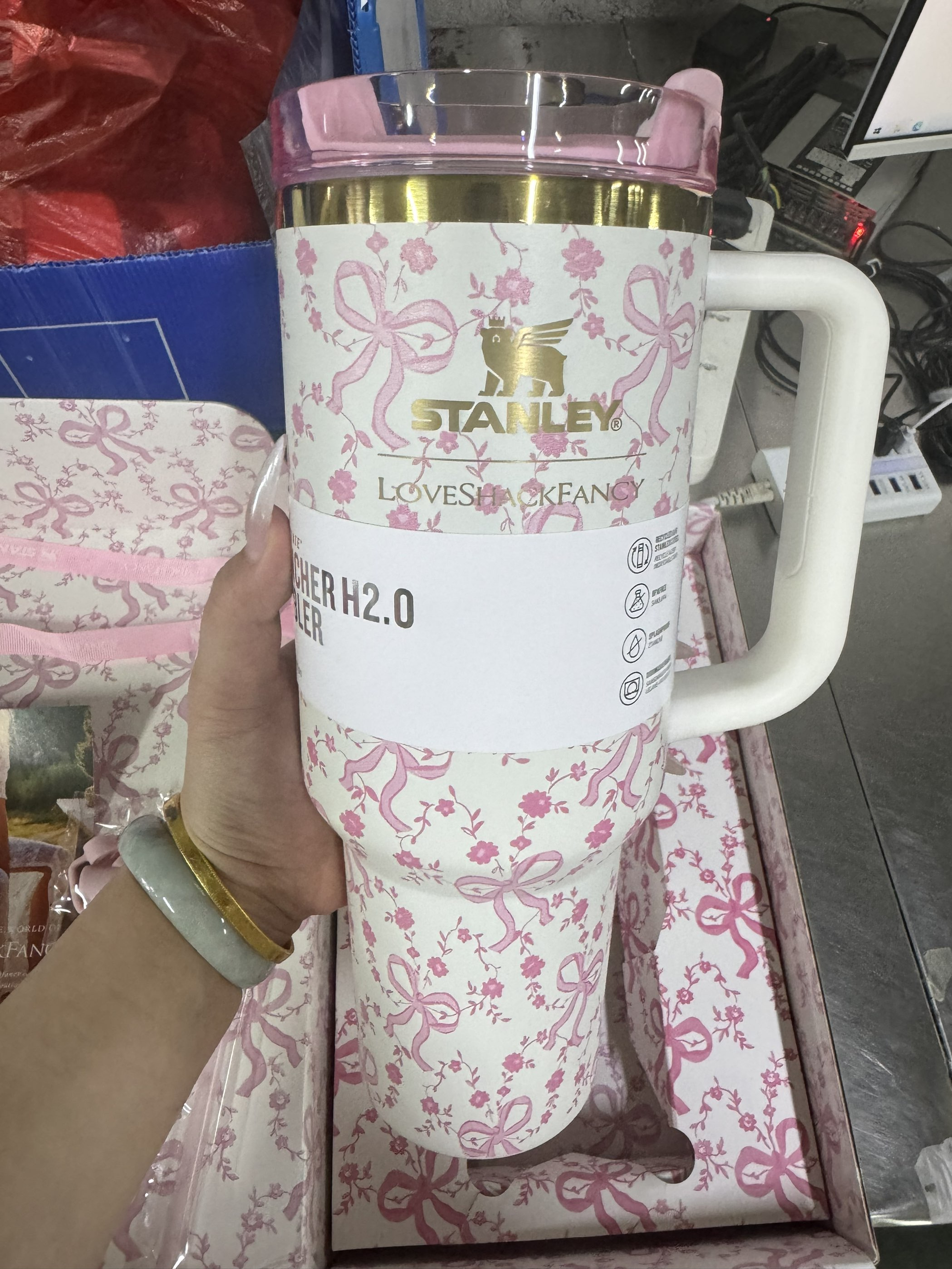 Stanley LoveShackFancy Holiday H2.0 FlowState 40oz insulated tumbler with Coquette Bow Chantilly design and floral pattern.